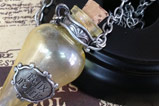 03-Colgante-con-expositor-Felix-Felicis-harry-potter.jpg