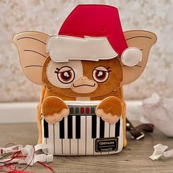 Dale un toque original y entrañable a tu estilo con esta mini mochila de Gremlins, protagonizada por el adorable Gizmo. Fabricada en cuero sintético con forro interior de poliéster, esta pieza sorprende por sus detalles bordados