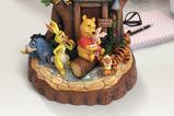 03-figura-pooh-tallada-con-el-corazon.jpg