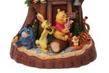 04-figura-pooh-tallada-con-el-corazon.jpg