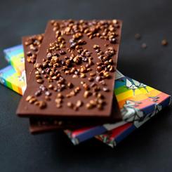 Pack de tabletas de chocolate Omnom compuesta por una tableta de Caramelo, una tableta de Café + Leche, una tableta de Black n' Burnt Barley y una tableta de Cookies + Cream.