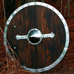 Espectacular escudo Vikingo con un acabado marrón oscuro, esta pieza de coleccionista está realizado en madera y decorado con partes de aluminio para darle mayor realismo. 