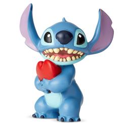 Romántica figura de Stitch con un corazoncito basada en la película Lilo & Stitch del año 2002 de Walt Disney. Esta preciosa figura vemos a Stitch con un corazón, la figura tiene unas dimensiones aproximadas de 6 x 9 x 6 cm.