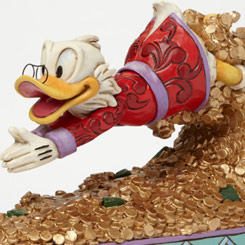 Figura del Tío Gilito nadando y buceando en su montaña de dinero, esta divertida figura tiene una altura aproximada de 12,5 cm., se ha mezclado la magia de las figuras de Walt Disney.