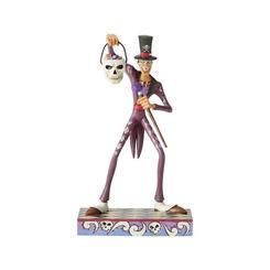 Figura del Dr. Faciler del clásico Disney “Tiana y el Sapo” elaborada por el artista Jim Shore. Esta figura tiene unas medidas aproximadas de 18.4 x 11 x 10 cm., y se ha mezclado la magia de las figuras de Walt Disne