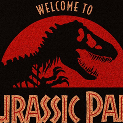 Felpudo Welcome to Jurassic Park basado en la saga de Jurassic Park y Jurassic World, ideal como felpudo de bienvenida. Medidas aproximadas de 40 cm. x 60 cm., realizado en fibra de coco.