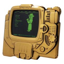 El brillo gastado del yermo se concentra en este lingote Pip-Boy Fallout, una pieza pequeña pero con presencia de reliquia encontrada tras años bajo la puerta de un Refugio. 
