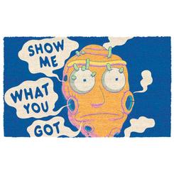 Humor interdimensional desde el primer paso. Este felpudo “Show Me What You Got” de Rick and Morty pone en la puerta el emblemático rostro del cráneo gigante sobre un fondo azul intenso y bocadillos tipográficos 