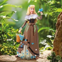 ¡Celebra el 65º aniversario de "La Bella Durmiente" con la encantadora Figurina Briar Rose Botanical! La princesa Aurora, bajo su identidad secreta como Rosa, se une a la colección floral Disney Showcase