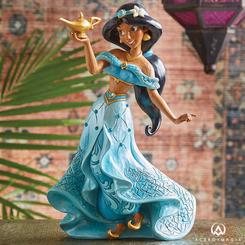 Descubre la obra maestra deluxe de la Princesa Jasmine de Aladdín de Disney. Pintada a mano y tallada a mano, decorada con joyas y llena de detalles intrincados. Perfecta para cualquier coleccionista de Disney Traditions.