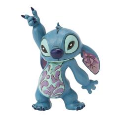 Con su energía desbordante y mirada traviesa, este mini Stitch de Jim Shore captura el espíritu juguetón del extraterrestre más adorable mientras levanta una pata en un paso de baile lleno de ritmo y encanto. 
