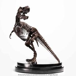 La majestuosidad del Tyrannosaurus Rex cobra vida con la estatua de élite de la línea de criaturas de Jurassic Park. Presentamos la impresionante versión en bronce del esqueleto del T-Rex, una obra maestra en honor al 30 aniversario
