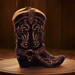 Un portalápices bota cowboy Wild West no se limita a ordenar un escritorio: coloca una escena del Oeste sobre la mesa. La silueta de la bota, oscura y ornamentada, convierte este portalápices bota cowboy Wild West en una pieza decorativa con presencia