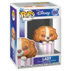 Figura POP Disney La Dama y el Vagabundo Lady en vinilo con caja regalo. Representa a Lady en una pose adorable dentro de una caja con rayas, ideal para coleccionistas y fans de Disney.