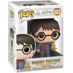 Figura POP Harry Potter Holiday de vinilo con 9 cm de altura. Presenta a Harry con bufanda roja y una figura dorada, en caja regalo con ventana para exposición.