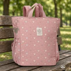 Mochila Luma Mickey Disney de 32x35x13 cm en poliéster con diseño rosa y estampado de siluetas de Mickey Mouse, incluye llavero metálico y bolsillos laterales para uso práctico y estiloso.